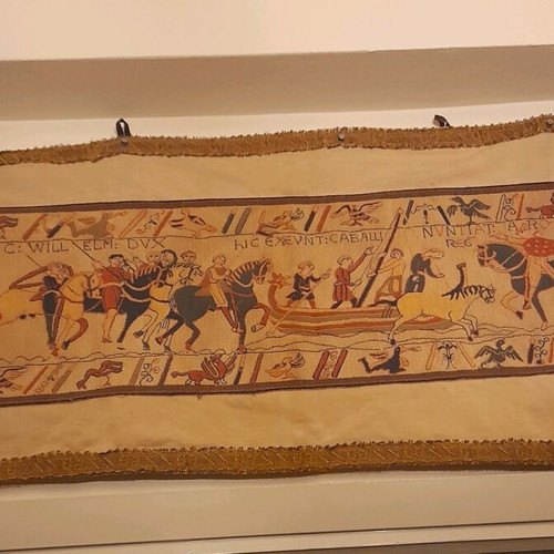 Bayeux tapestry used with golden border on canvas