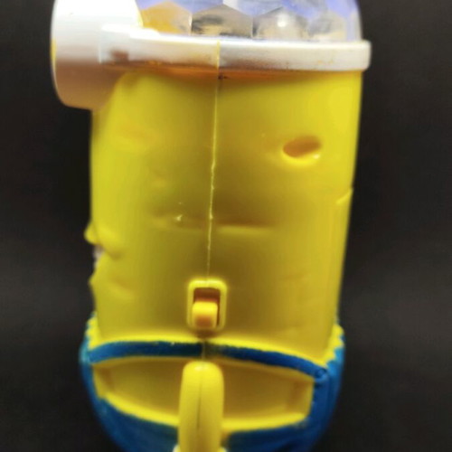 Minion figure used with rotating light and sound