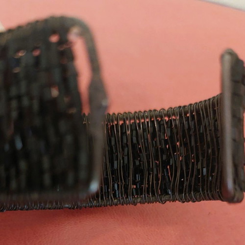 Black bracelet used, adjustable size
