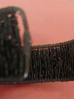 Black bracelet used, adjustable size