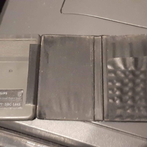 Philips pocket calculator used with vintage card holder