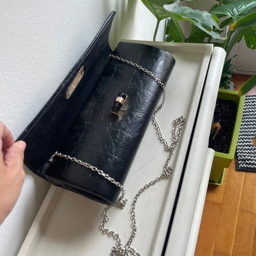 Clutch bag like new, black with chain strap for shoulder or hand