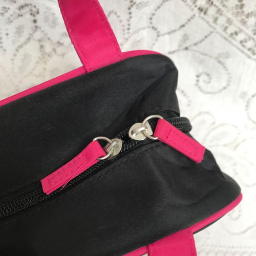 Avon Large Collectible Makeup Bag Black Pink Fuchsia with ergonomic pockets and plenty of space for cosmetics