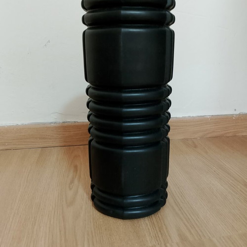 Foam roller like new with textured surface for massage and muscle recovery