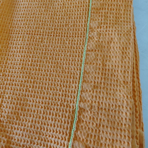 Pique blanket like new, orange cotton with green stripe