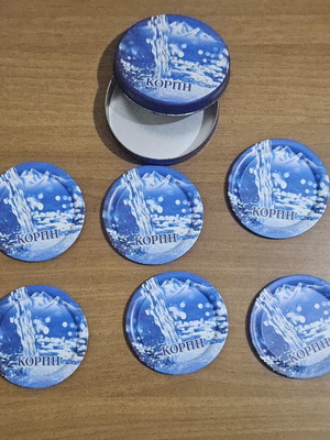 Korpi Metallic Promotional Coasters set of 6 like new, 9 cm diameter