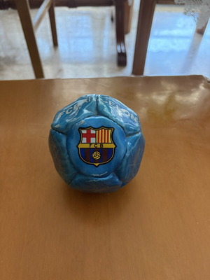 Decorative Barcelona ball with Messi, Xavi, Iniesta signatures