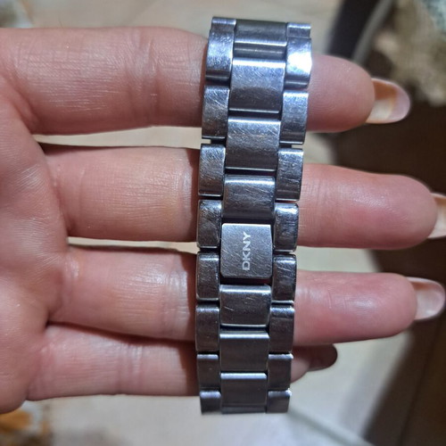 DKNY women's watch used, stainless steel with turquoise dial