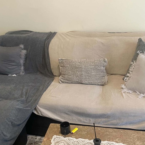 Corner sofa used with some marks, functional