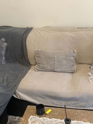 Corner sofa used with some marks, functional