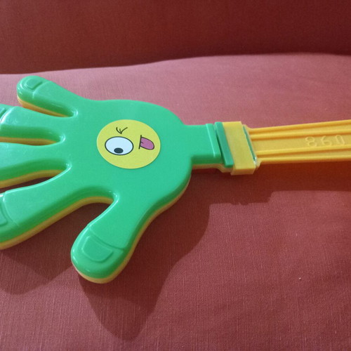 Hand Clapper toy used, plastic noise maker