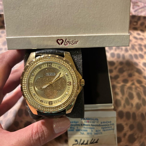 Loisir watch like new with black leather strap and gold details