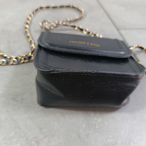 Small black crossbody bag with gold chain like new