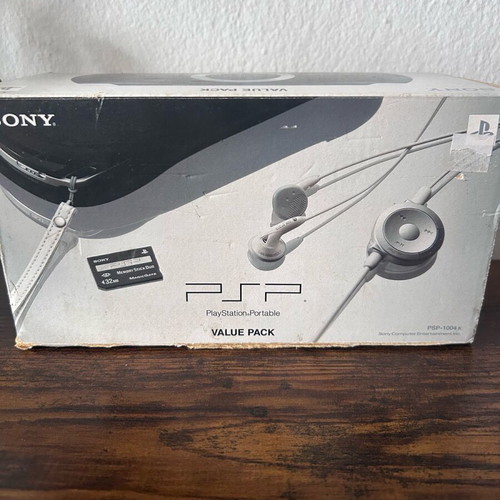 Sony PlayStation Portable PSP-1004 used with original box and accessories