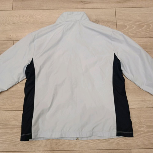 Vintage Nike windbreaker jacket used in ice blue with dark navy details