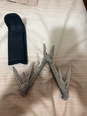 Multitool like new with black case