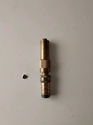 Bronze water nozzle like new, adjustable for garden hose