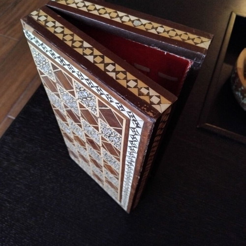 Handmade chess with mother-of-pearl and ancient Egyptian figures used