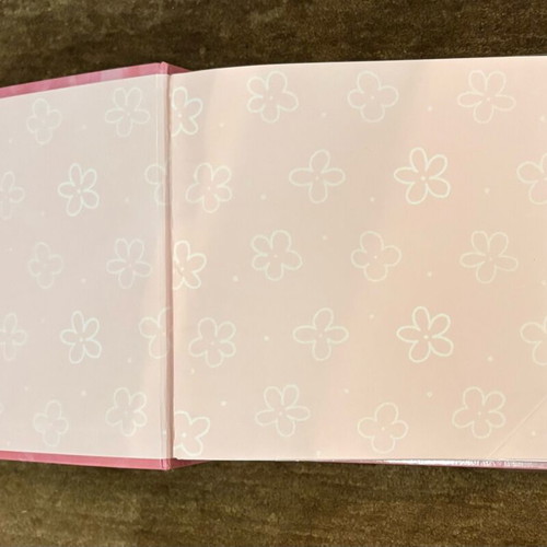 Photo albums in two different designs like new