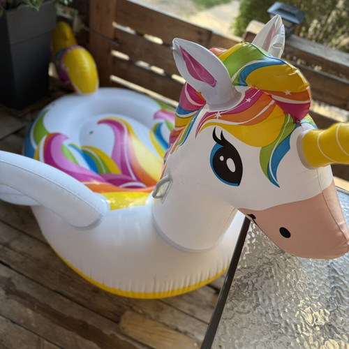 Inflatable Unicorn Pool Float like new, colorful rainbow design