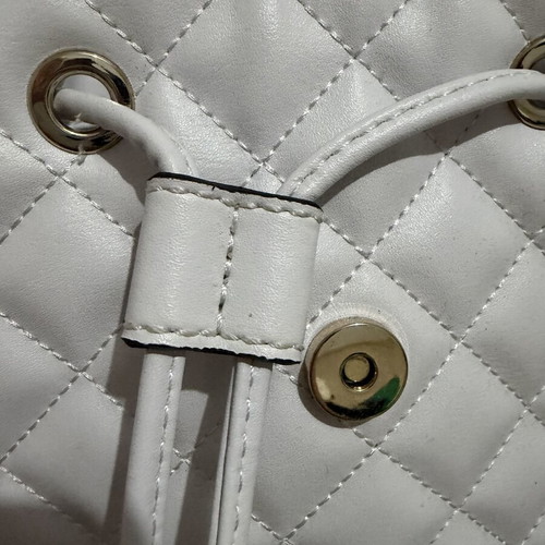 Guess Backpack white like new with silver details and charm