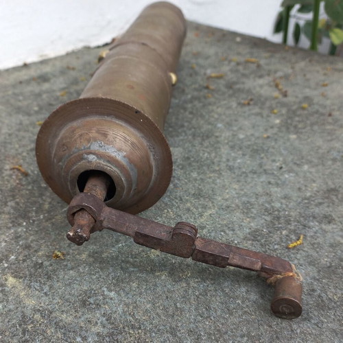 Old brass coffee-pepper grinder used