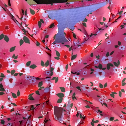 Floral swimsuit used, pink with white and red flowers, size XL