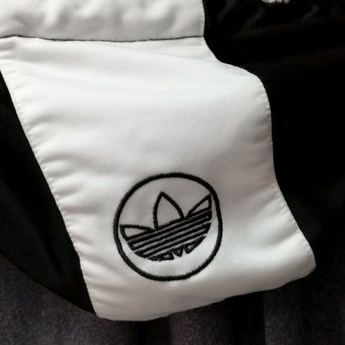 Vintage Adidas men's short sleeve tracktop from 1990, used, size XL