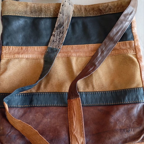 Crossbody bag made of suede used with signs of wear