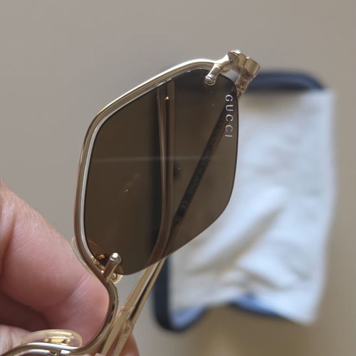 Gucci sunglasses, brown and gold