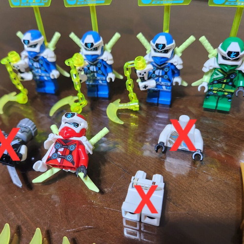 Lego Ninjago figures used with weapons