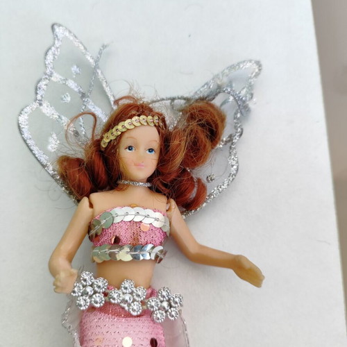 Fairy Mermaid Decorative Doll like new with pink tail and silver wings