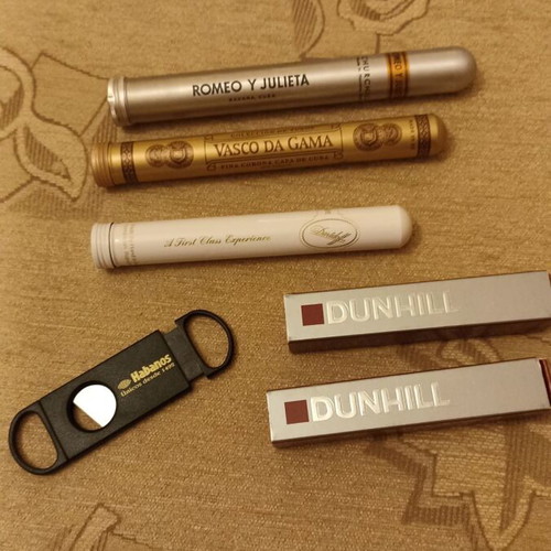 Vintage Dunhill matchboxes and aluminum cigar tubes used set