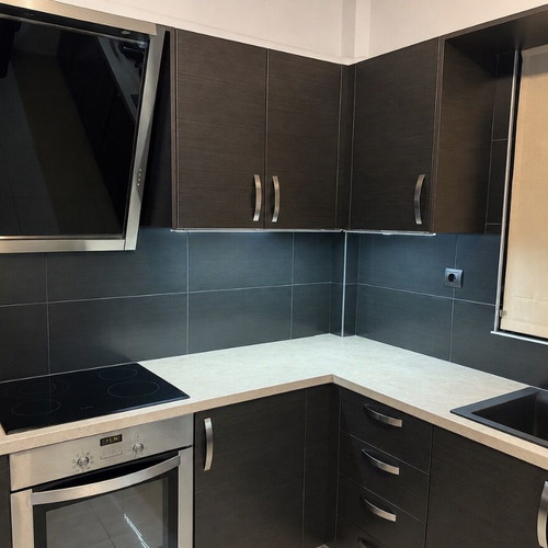 Kitchen cabinets like new with built-in Pitsos oven and island