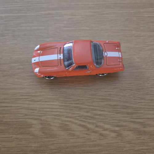 Hot Wheels 1968 Mazda Cosmo Sport orange racing line, like new