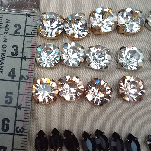 Glass rhinestones on metal base like new for sewing