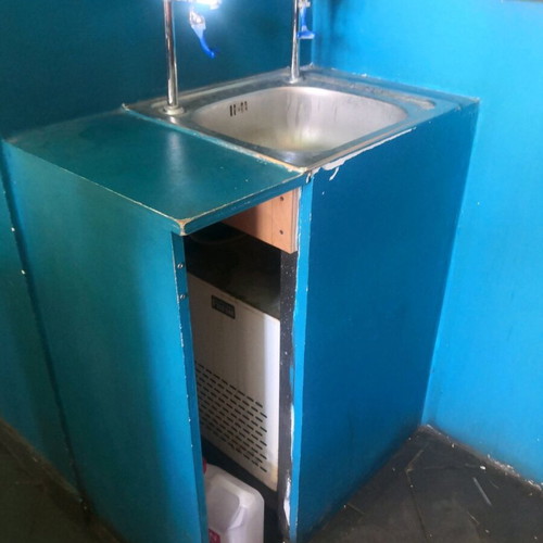 Professional water cooler used with sink and 2 automatic taps