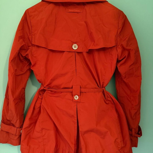 Henry Cottons red lightweight jacket used with detachable hood