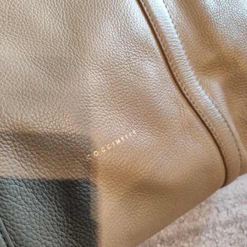 Coccinelle leather handbag beige like new