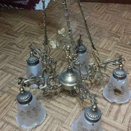 Bronze five-light chandelier used with broken glass