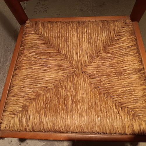Wooden chair used with cane seat and embossed wood
