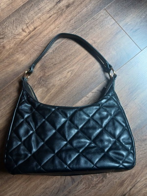 Nolah black shoulder bag quilted design like new