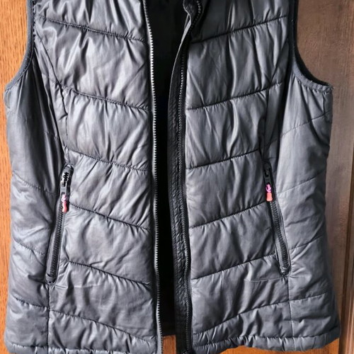 H&M sleeveless women's jacket black like new, size 42
