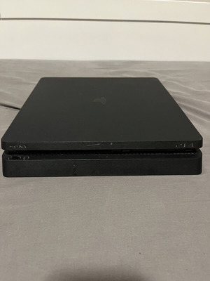 PlayStation 4 Slim 1TB console like new with controller