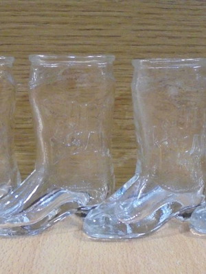 Jim Beam bourbon whiskey set of four used promotional boot-shaped shot glasses