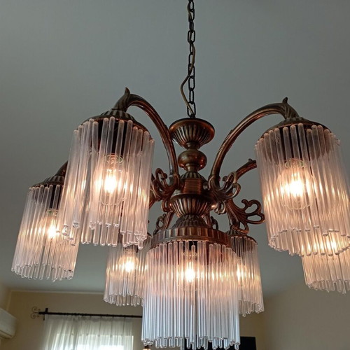 Bronze chandelier like new with crystals, unique detail