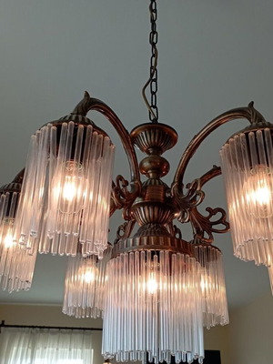 Bronze chandelier like new with crystals, unique detail