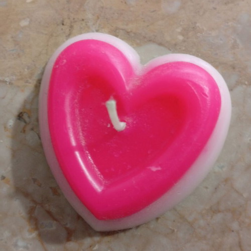 Handmade heart-shaped candle