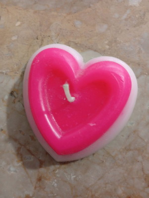 Handmade heart-shaped candle