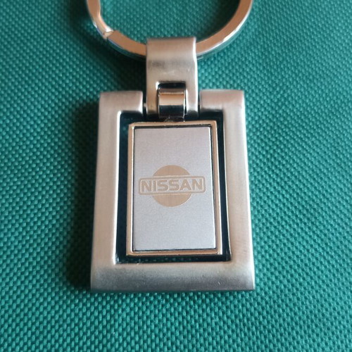 Vintage Nissan spinning keychain, New Old Stock, heavy metal 38g